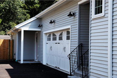 Carport - mid-sized craftsman attached two-car carport idea in Boston