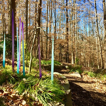 Glass sculptures mimic the tree line and add year-round color.