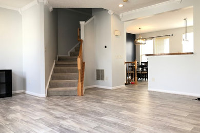 Living room - mid-sized modern living room idea in New York with gray walls