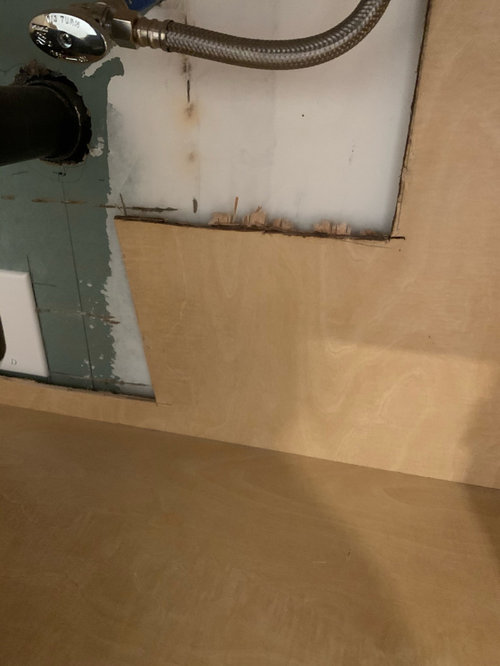 sloppy and massive hole for plumbing under bathroom vanity