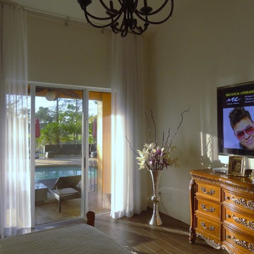 Master bedroom ripple fold sheer and blackout drapes