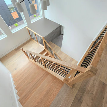 Project #108 | Red Oak Staircase in Light-Filled Space