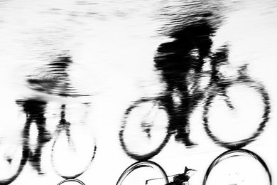 Reflected Cyclists.  40 x 60 inch Print.