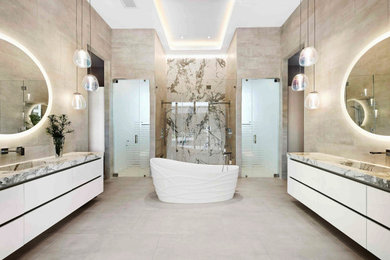 Bathroom - huge contemporary master beige tile and ceramic tile ceramic tile, gray floor and single-sink bathroom idea in Miami with flat-panel cabinets, white cabinets, a one-piece toilet, an integrated sink, quartz countertops, white countertops and a floating vanity