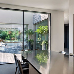 Contemporary Home with Invisible Sliders - Windows And Doors