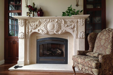 Mid-sized elegant formal and enclosed medium tone wood floor and brown floor living room photo in Chicago with a stone fireplace, a standard fireplace, beige walls and no tv