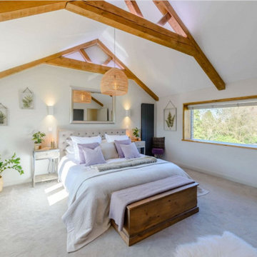 Master bedroom with vaulted ceiling