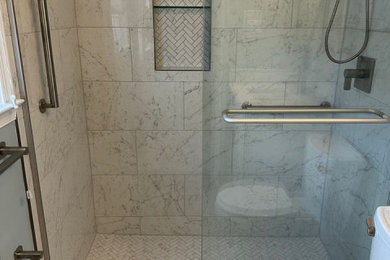 Sliding shower door - small master white floor and single-sink sliding shower door idea in DC Metro