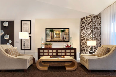 Mid-sized trendy open concept and formal concrete floor and gray floor living room photo in Miami with a wall-mounted tv, white walls and no fireplace