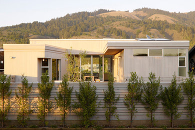 Inspiration for a small coastal beige one-story exterior home remodel in San Francisco