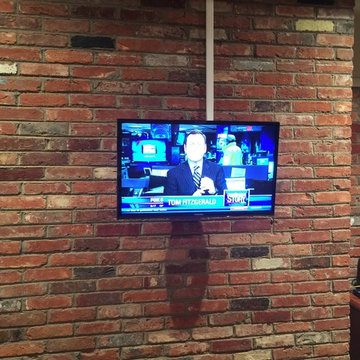 TV on a brickwall