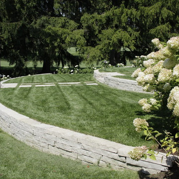 Full Landscape with Patio, Outdoor Kitchen, Stone Driveway and Planting