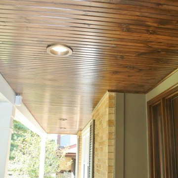 Stained wood porch ceiling. Installed by Opal Enterprises in Naperville