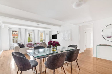 Example of a minimalist dining room design in New York