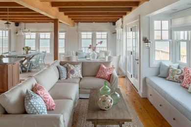 Inspiration for a mid-sized coastal open concept light wood floor living room remodel in Boston with white walls