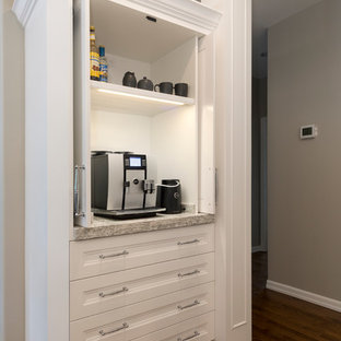 Large transitional eat-in kitchen inspiration - Eat-in kitchen - large transitional l-shaped medium tone wood floor and brown floor eat-in kitchen idea in Boise with an undermount sink, shaker cabinets, white cabinets, quartz countertops, gray backsplash, porcelain backsplash, stainless steel appliances, an island and gray countertops
