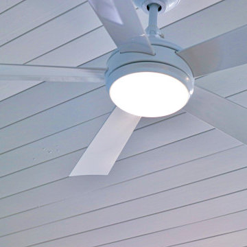 Modern White Ceiling Fan on Beadboard Ceiling