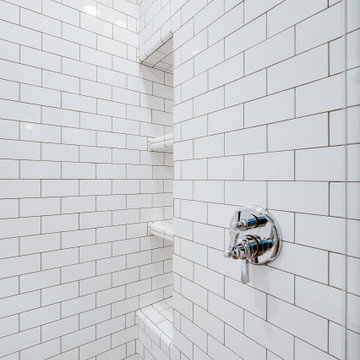 Craftsman Subway Tile Bathroom with Custom Mosaic Floor