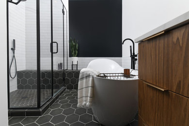 Bathroom - small mid-century modern master white tile and subway tile porcelain tile, black floor and single-sink bathroom idea in Chicago with flat-panel cabinets, medium tone wood cabinets, a one-piece toilet, white walls, an undermount sink, quartzite countertops, a hinged shower door, white countertops and a built-in vanity