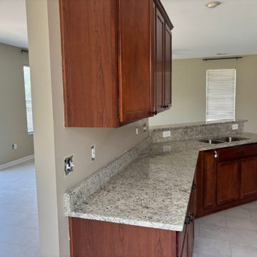 Speckled granite kitchen peninsula