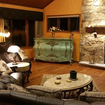 Country French rustic family room with Chateau TV lift cabinet