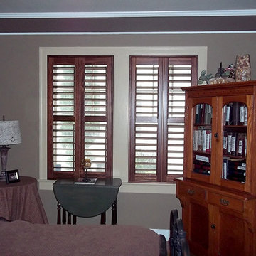 Stained Shutters on White Casement Windows