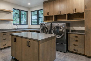 Example of a laundry room design in Other