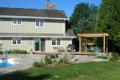 Example of a mountain style home design design in Toronto