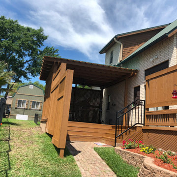 Lake house deck, cover, and dog door porch with cover