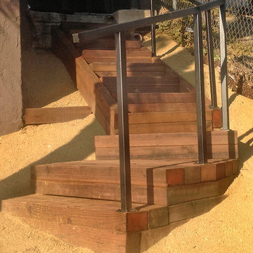 Rustic Wood Stairs with Metal Railing