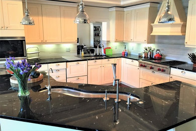 Example of a classic kitchen design in Other