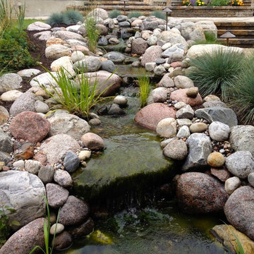 Relaxing Retreat with a Natural Pond Water Feature