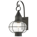 Livex Lighting - Charcoal Nautical, Farmhouse, Bohemian, Colonial, Outdoor Wall Lantern - The Newburyport outdoor large single-light wall lantern boasts classic nautical and railway styling. This piece features a beautiful hand-blown clear glass globe and a charcoal finish over the hand crafted solid brass construction. With its easy installation and low upkeep requirements, this light will not disappoint.