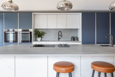 Design ideas for a contemporary kitchen in Sussex.