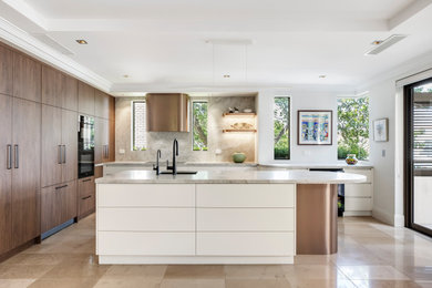 This is an example of a contemporary kitchen in Sydney.