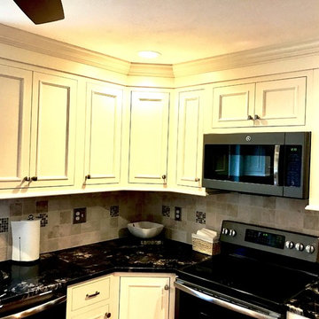 Transitional Dove Kitchen Remodel with Custom Sized Glass Tiles