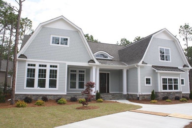 Craftsman gray two-story vinyl exterior home idea in Other with a shingle roof