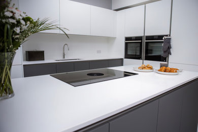 This is an example of a modern kitchen in Manchester.