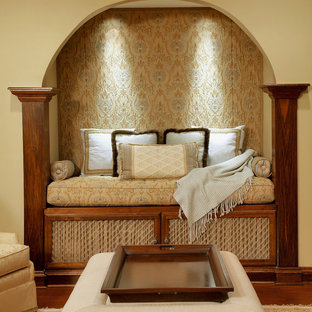 Inspiration for a medium sized mediterranean basement in DC Metro with beige walls, brown floors, no fireplace and dark hardwood flooring.