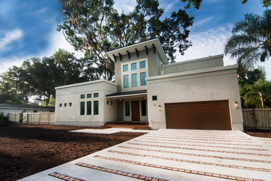 Photo of a contemporary home design in Tampa.