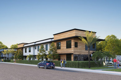 マイアミにある高級なコンテンポラリースタイルのおしゃれな家の外観 (アパート・マンション、混合材屋根、縦張り) の写真