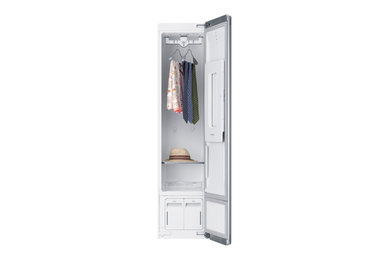 Example of a mid-sized minimalist closet design in Other