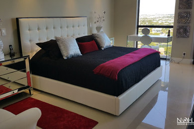 Mid-sized trendy master marble floor bedroom photo in Miami with beige walls