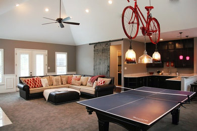 Large transitional open concept carpeted game room photo in Dallas with gray walls, a standard fireplace, a stone fireplace and no tv