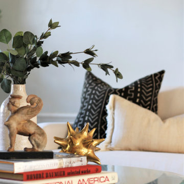 Coffee Table Styling with Unique and Brass Objects