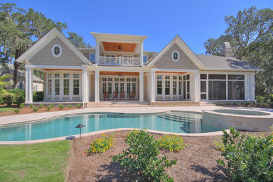 Hot tub - large traditional backyard stone and custom-shaped hot tub idea in Atlanta