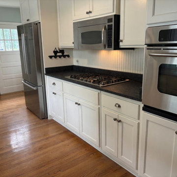 Dark speckled granite kitchen countertops