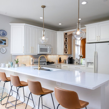 Contemporary White Kitchen Renovation with Custom Built-ins