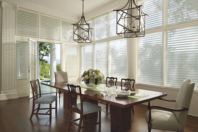 Enclosed dining room - large transitional dark wood floor enclosed dining room idea in Detroit with beige walls and no fireplace