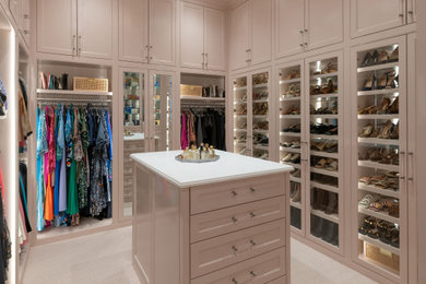 Inspiration for a huge transitional women's carpeted walk-in closet remodel in Dallas